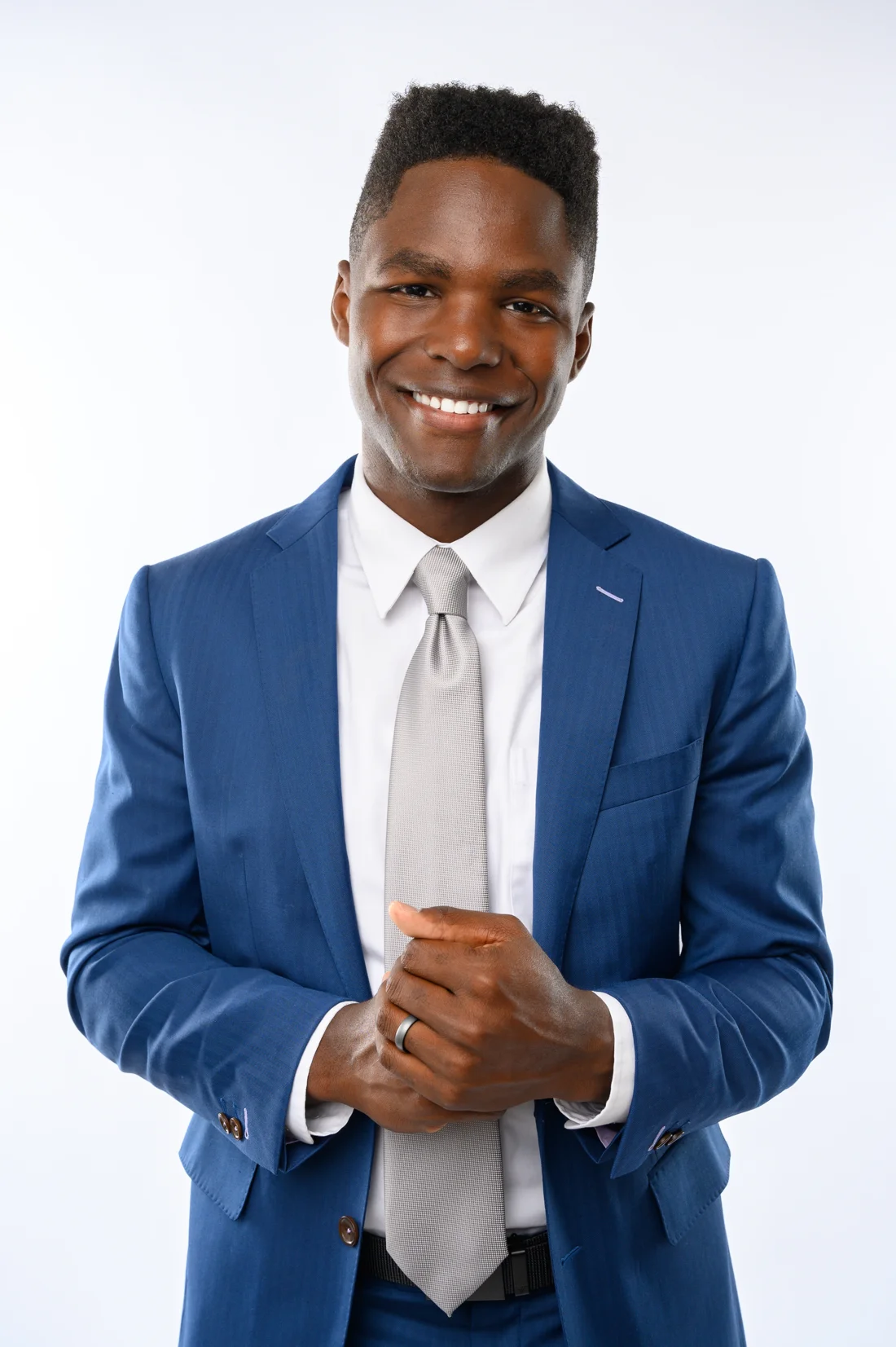 Brandon McBride in a blue suit